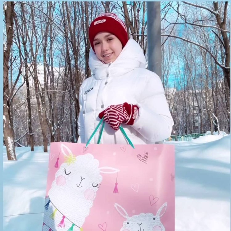 Kamila Valieva in the winter on the street