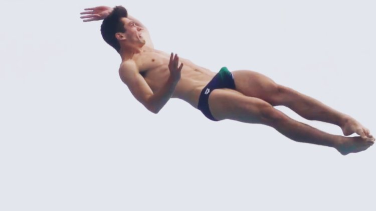 Vladimir barbu jumping in water