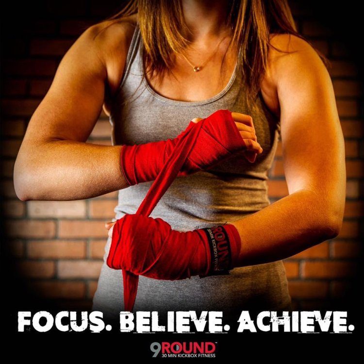 Girl with boxing pear