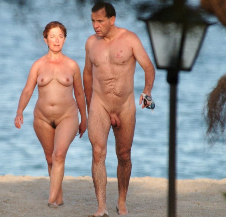 Naked men and women on the beach