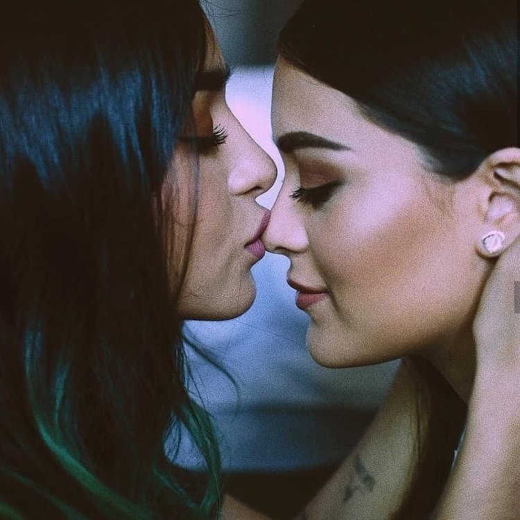 Young lesbian kiss lips
