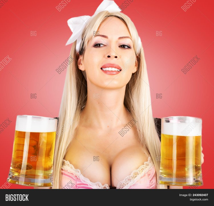 The girl holds a bacal on boobs