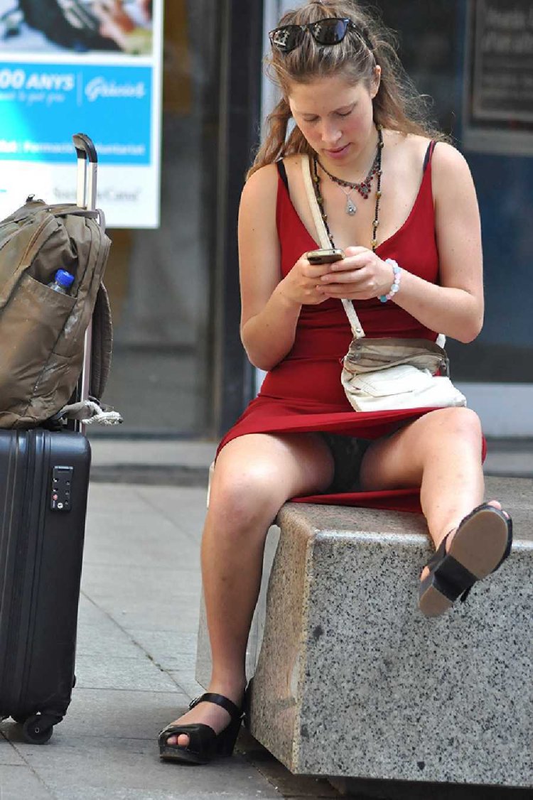 The girl lifts the dress