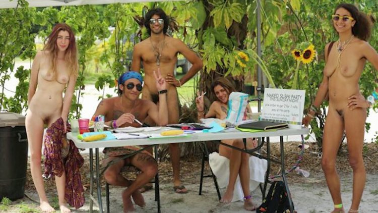 Swingers on a nudist beach