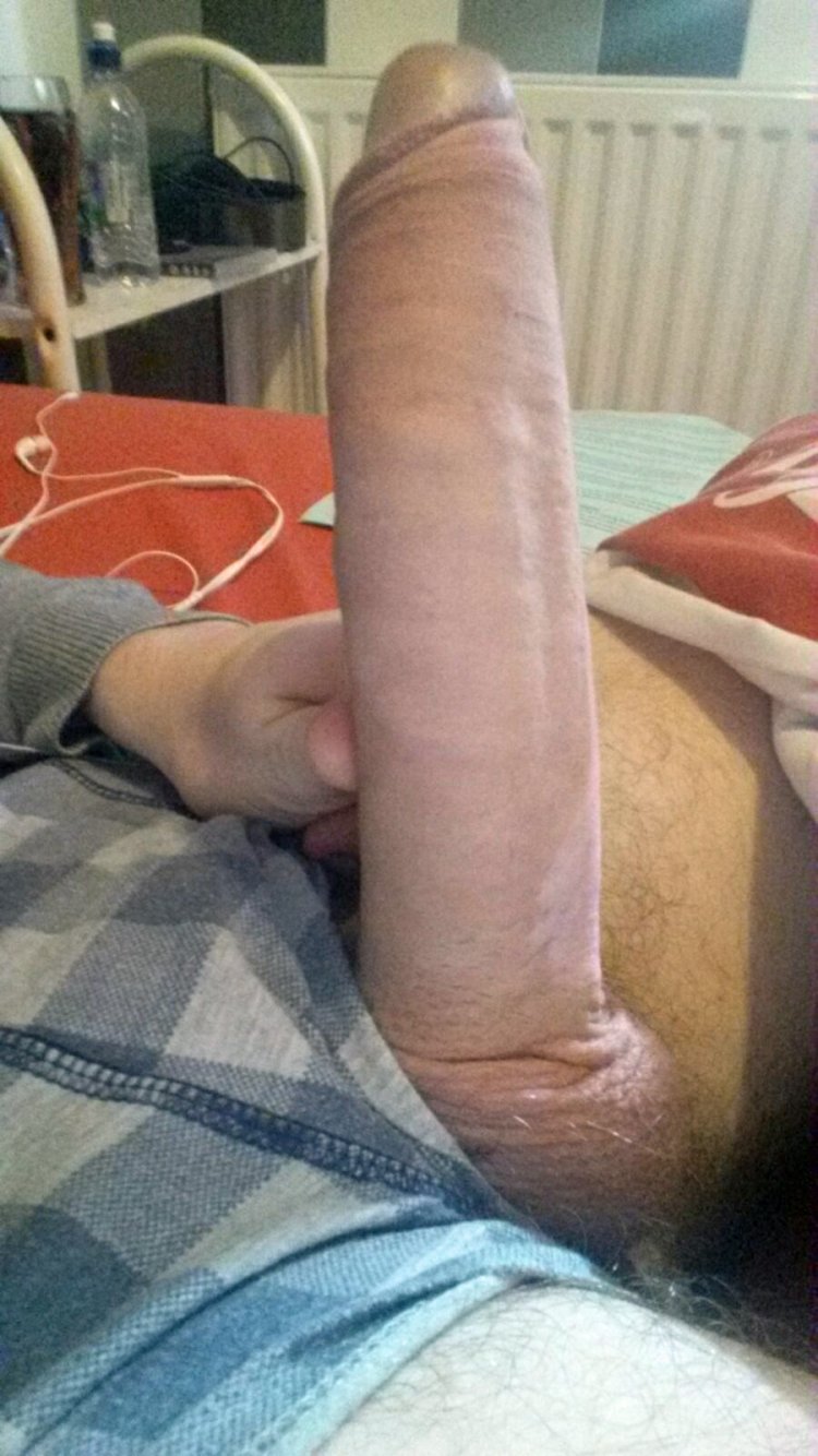 A young guy with a huge member