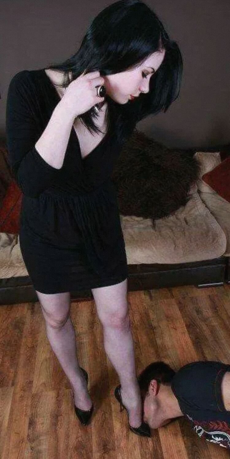 Slave kisses the legs