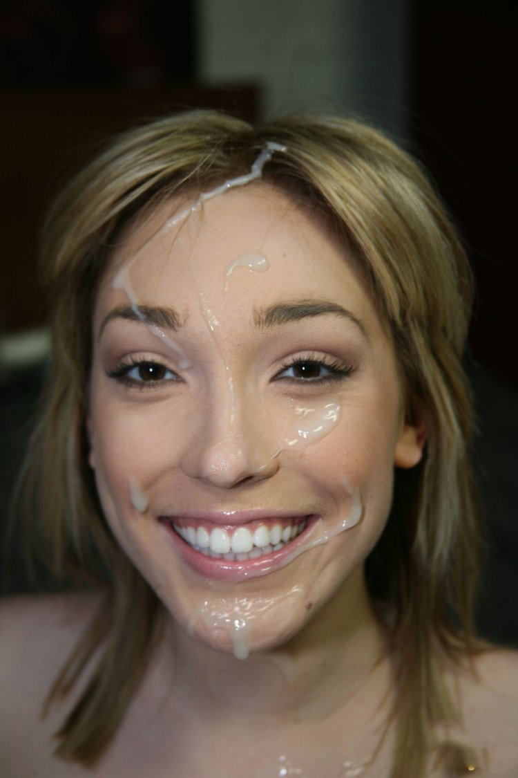Smiles with a cumshot on his face