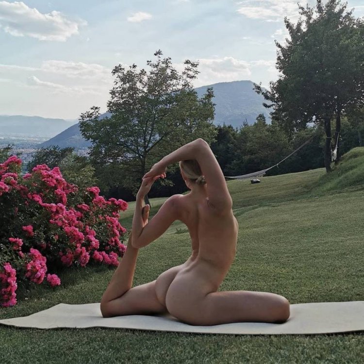 Naked yoga in the fresh air