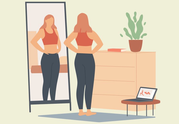 A woman in front of a mirror is unhappy with her stomach