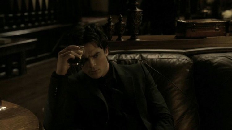 Damon Salvatore with a glass