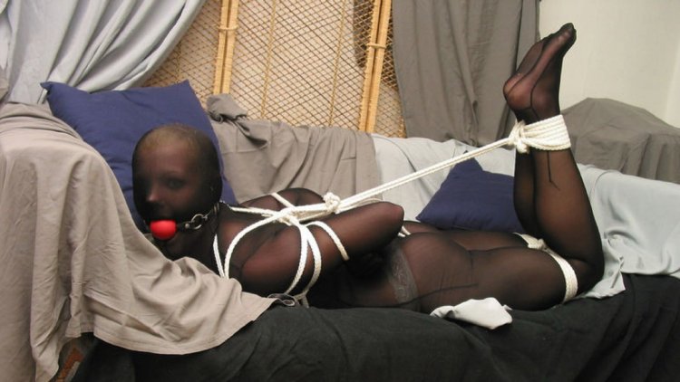 Black women associated in pantyhose BDSM