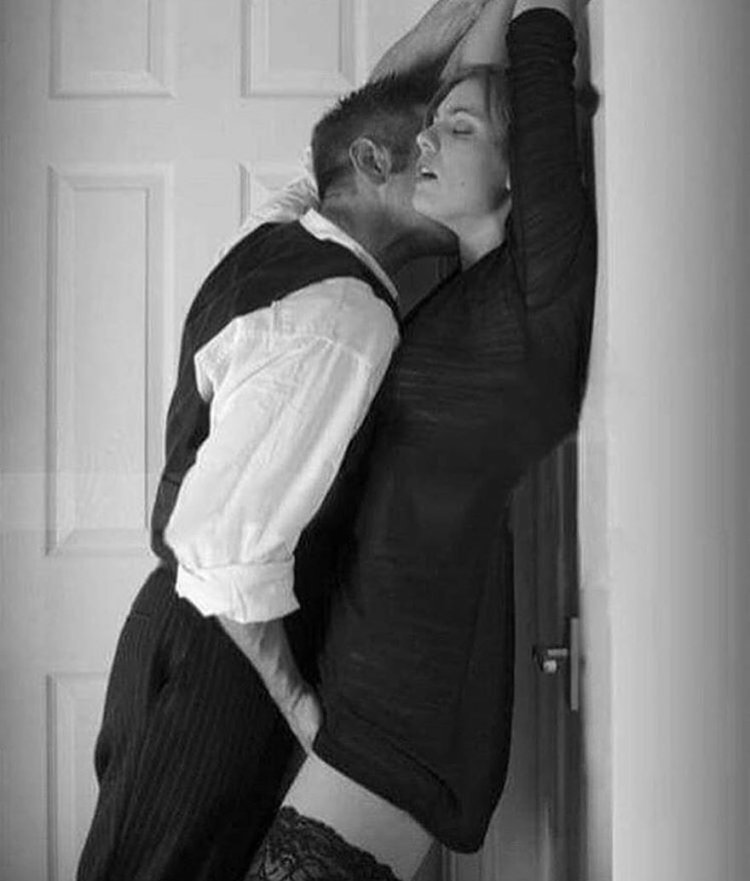 Pressed against the wall