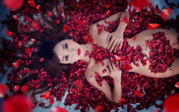 Girl in rose petals