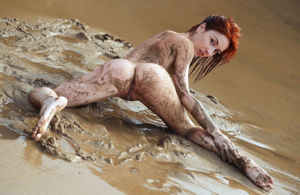 Erotic struggle in mud