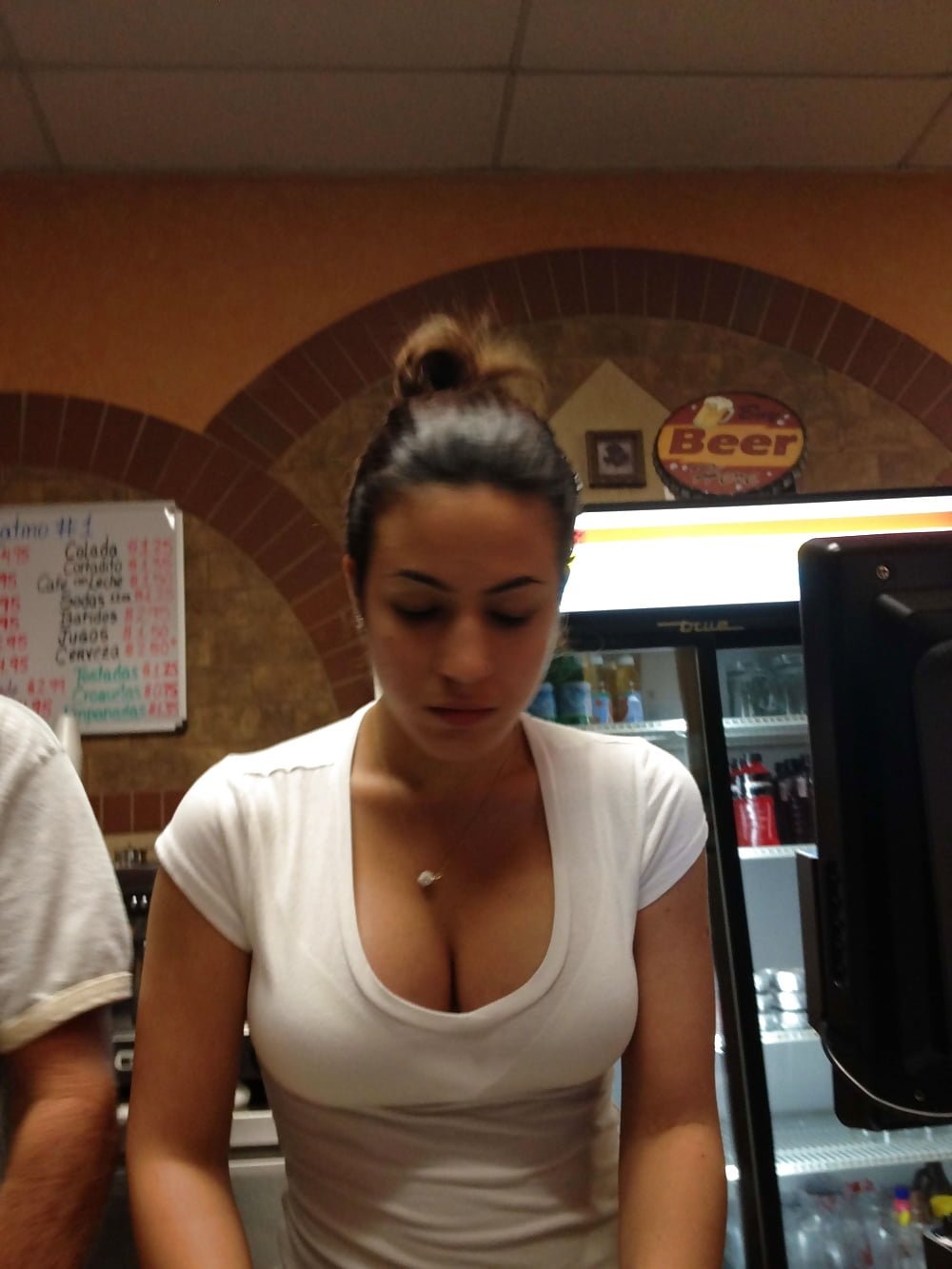 Mommy with huge breasts in a bra and glasses