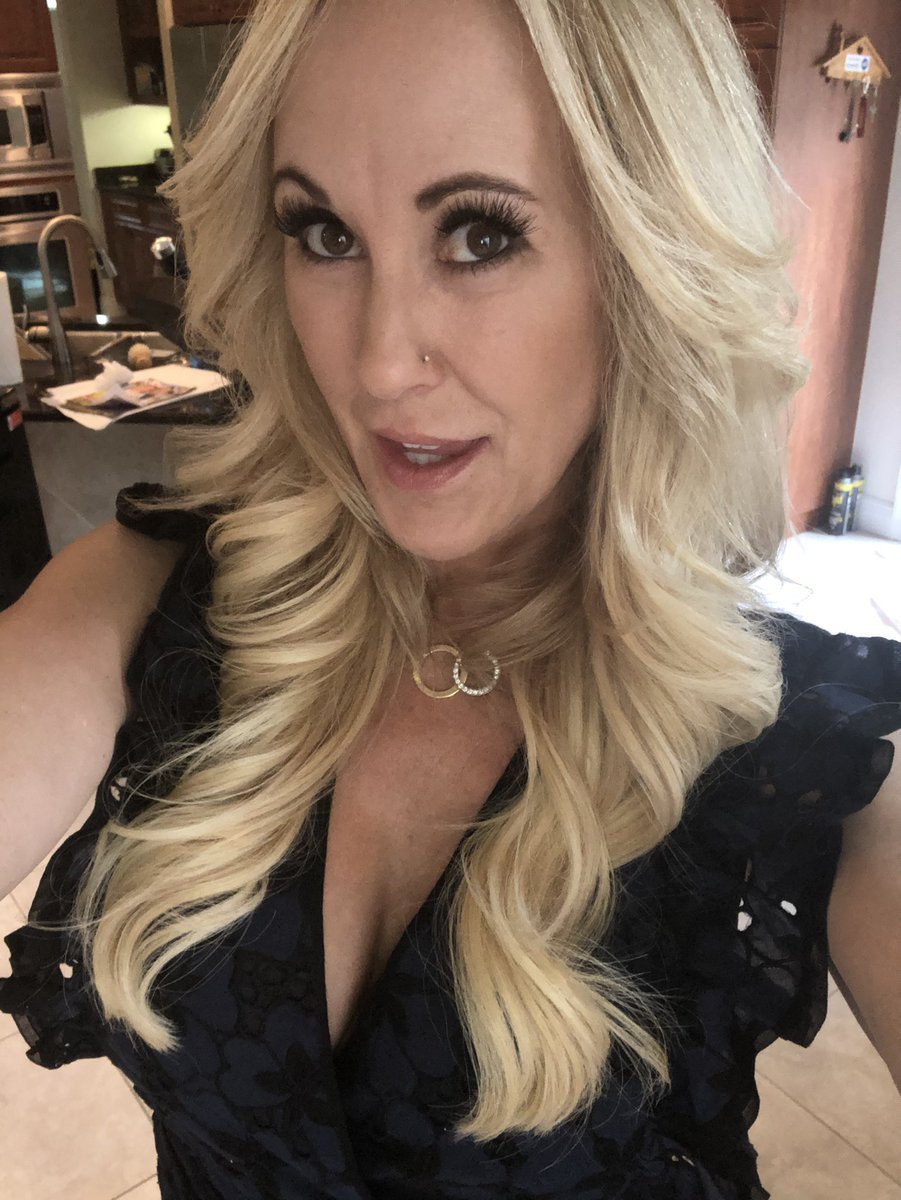 Naked Brandi Love on a computer screensaver gray background