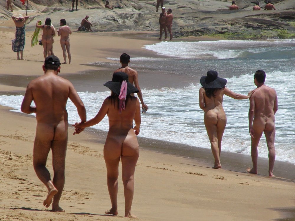 Naked girls sunbathe