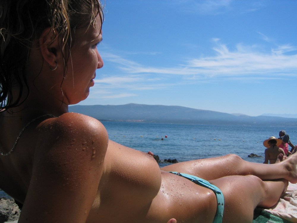 Selfies of girls on the beach topless