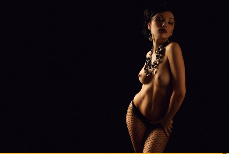 Nude on a dark background