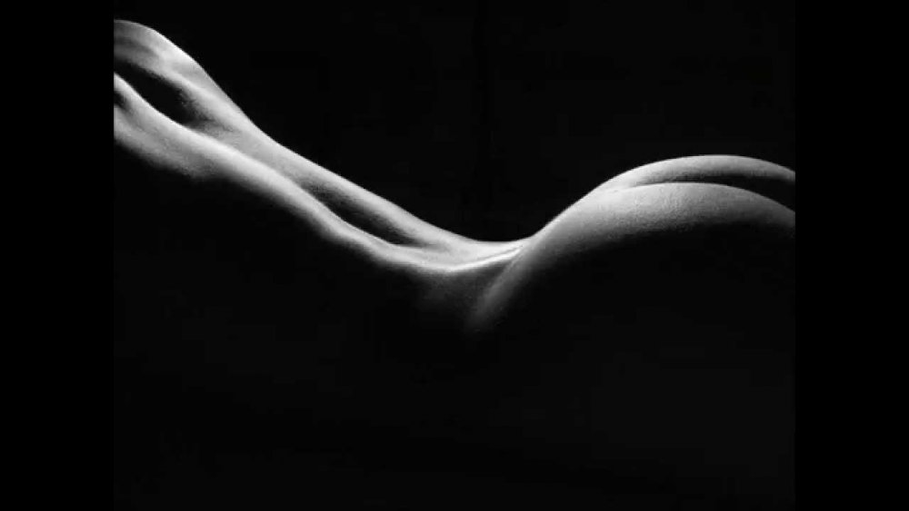 Bending of a naked female body