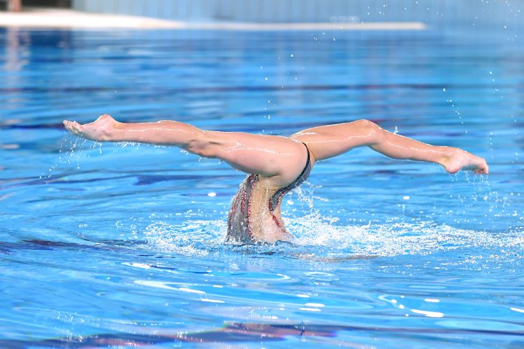 Naked busty girls, synchronous swimming