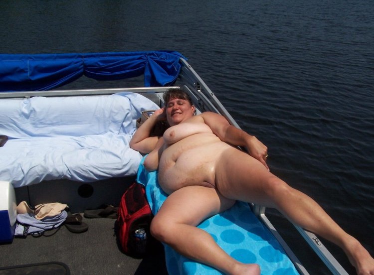 Naked haired on a deck chair