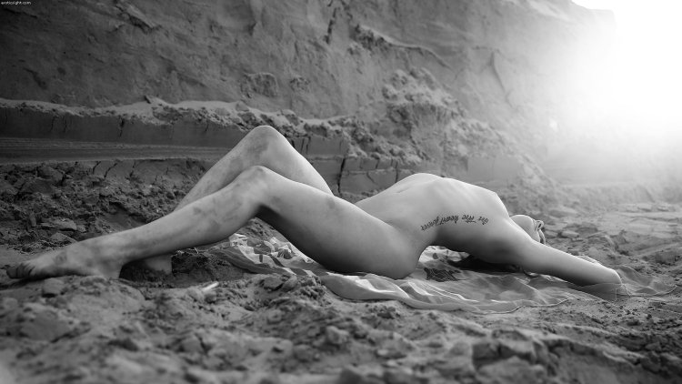 Embarrassed naked woman