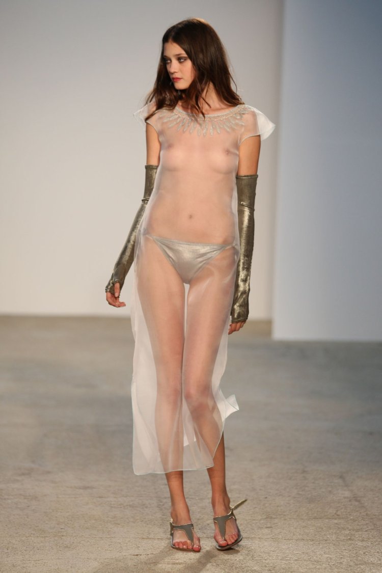 Fashionable showing with bare breasts