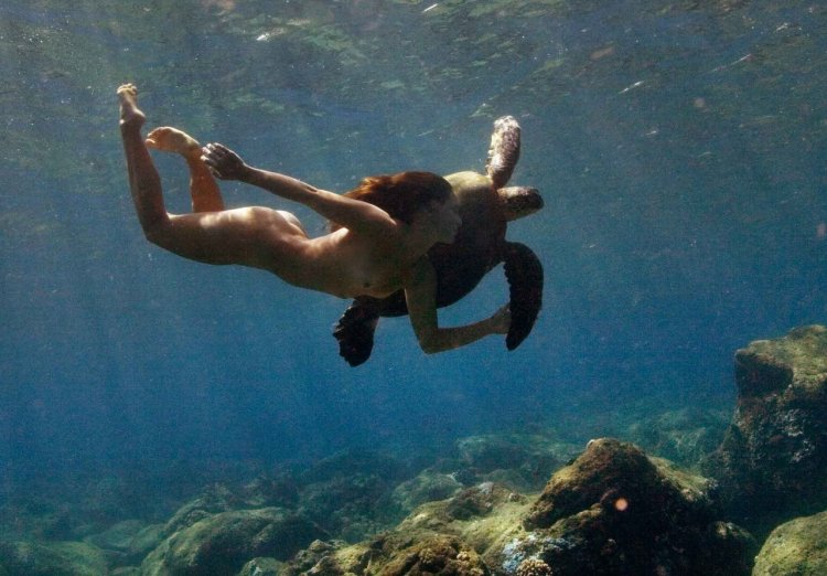 Swimming, diving, snorkeling naked