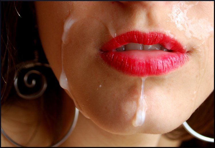 Cumshot on brightly red lips