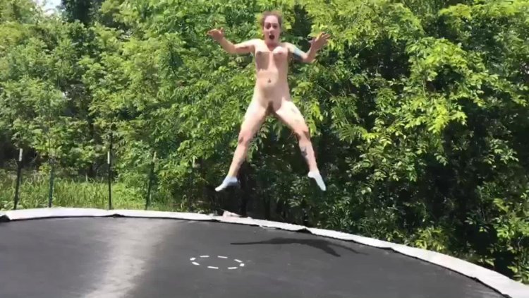 Naked women jumping in water