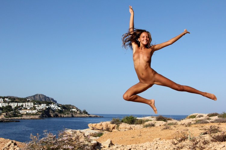 Naked girls jump into the water
