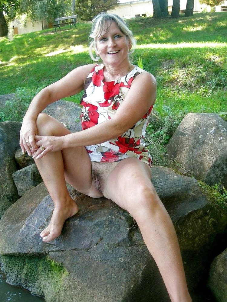 Mature in a dress without panties
