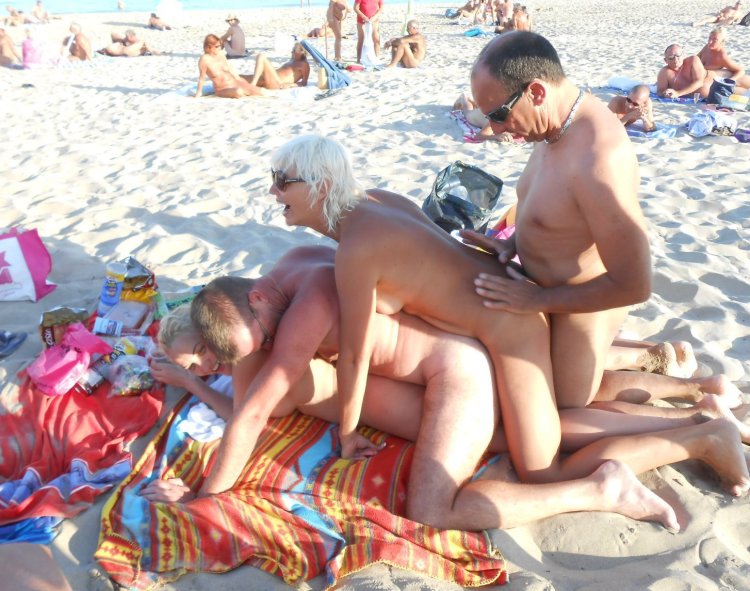 Amateur gangbang on the beach