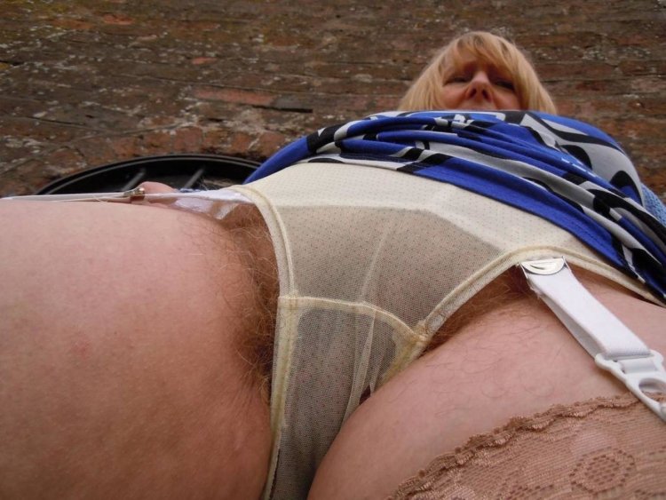 Old women in shorts close up