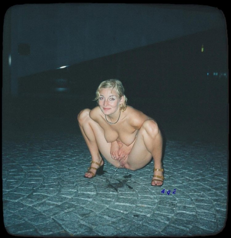 Naked woman at a dressed party