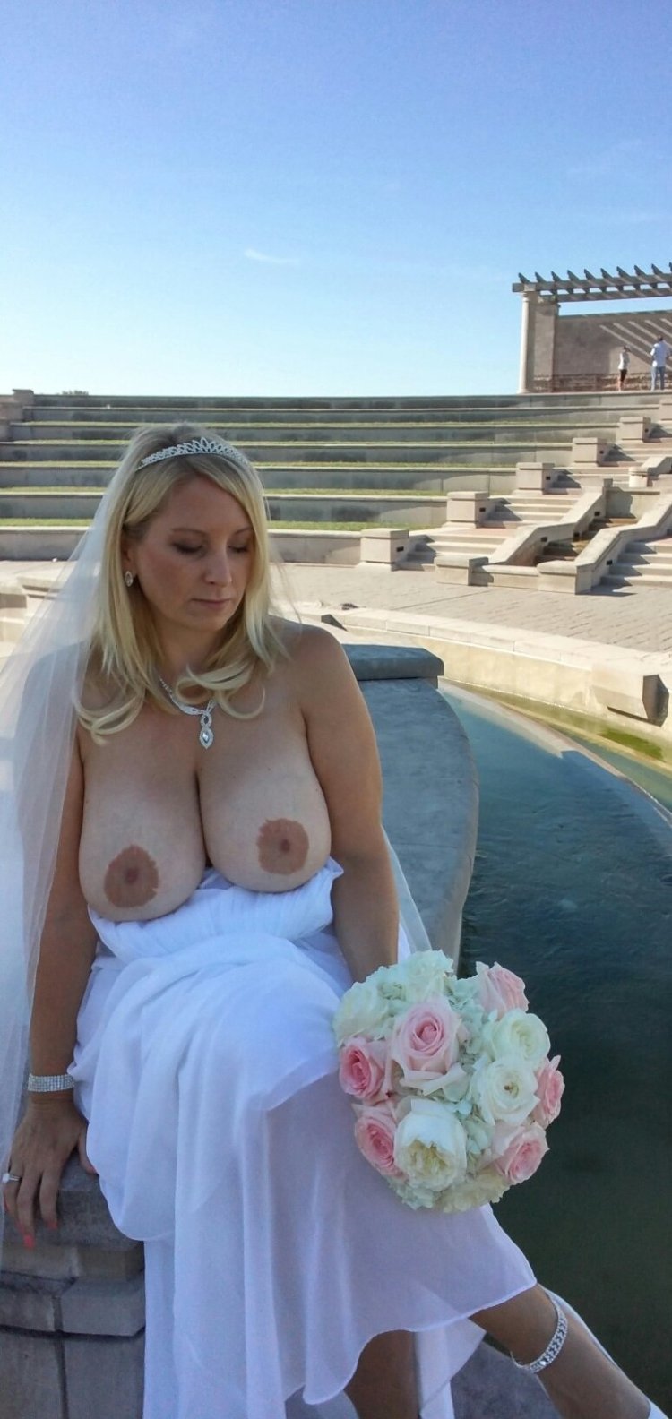 Naked girls in wedding dresses