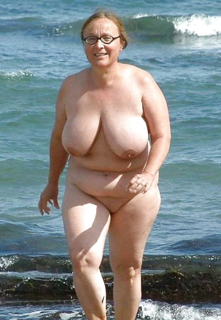Naked mature fat fat on the beach