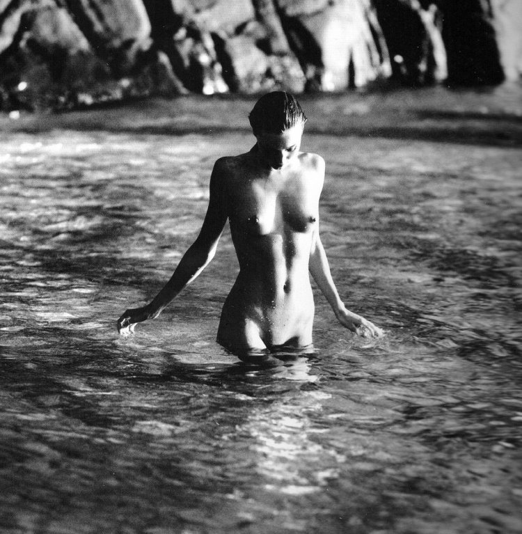 Miranda Kerr naked on the beach