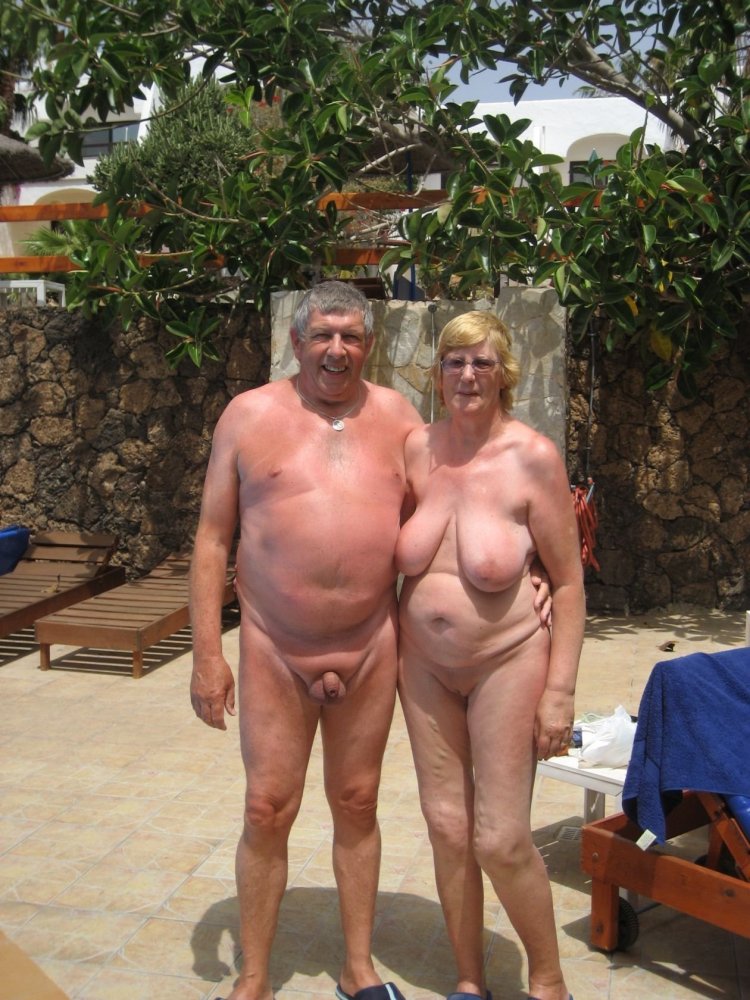 Naked mature couples on the beach