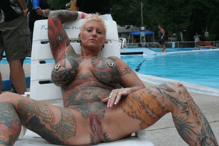 Naked mature in tattoos