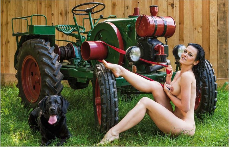 Soviet woman with bare tits on the tractor