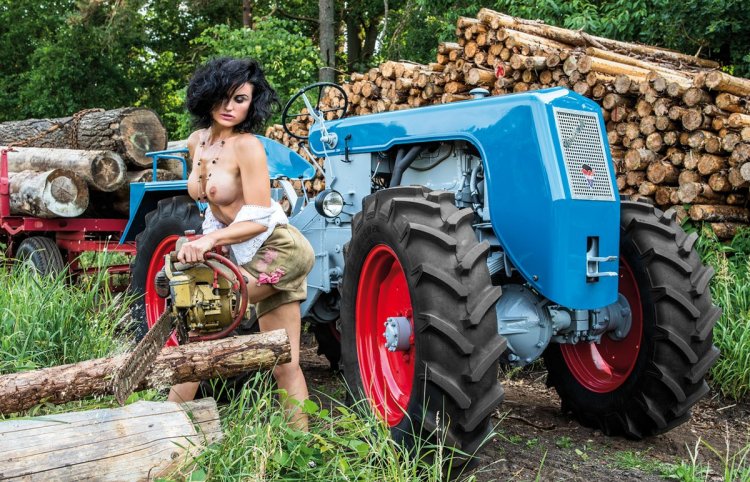 Girls and agricultural equipment