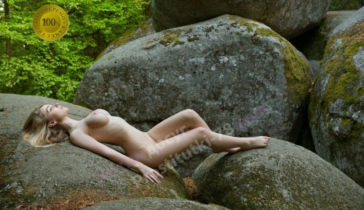 Naked photo session on stones