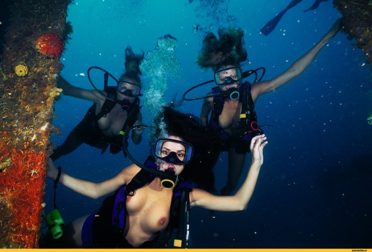 Girl under water diving
