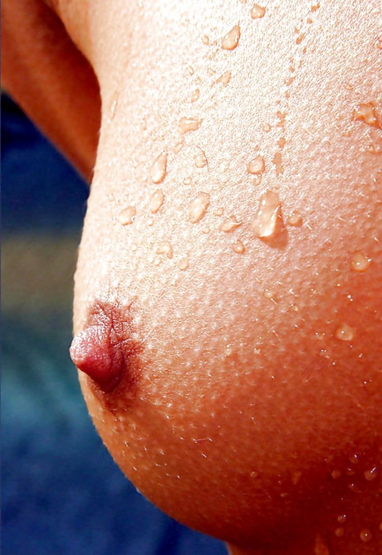 Girl caresses her breasts