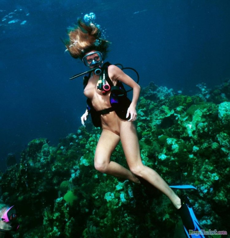 Underwater swimming girl