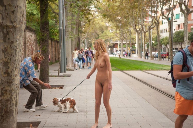 Woman undresses on the street