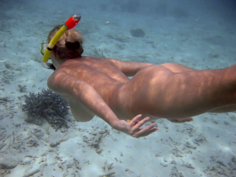 Naked girl diving