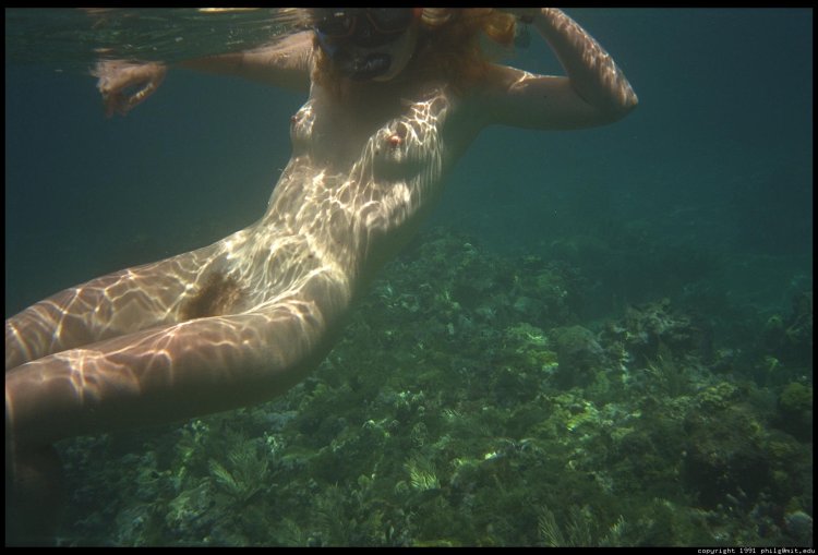 Naked women with scuba